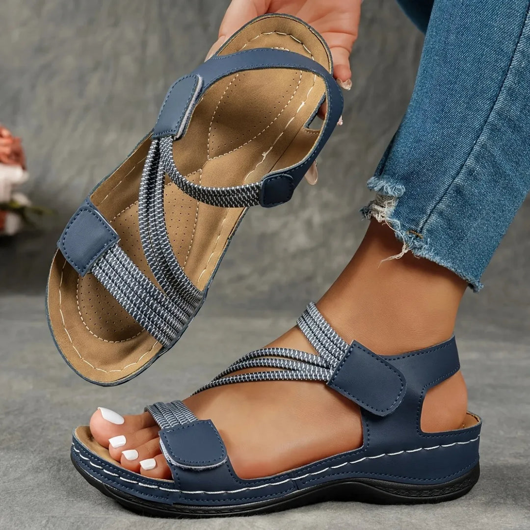 Amalyn women's navy adjustable strap flat sandals with contrast stitching, perfect for warm-weather outfits.