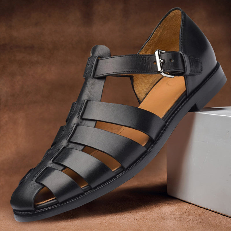 Clara black vegan leather fisherman sandals with woven closed-toe design and adjustable buckle strap.