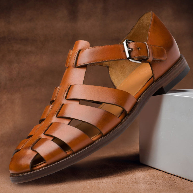 Clara women's tan vegan leather fisherman sandals with a closed-toe woven design and adjustable buckle strap.