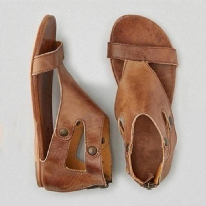Delaney women's cutout orthopedic ankle sandals in versatile neutral brown leather with secure strap styling.