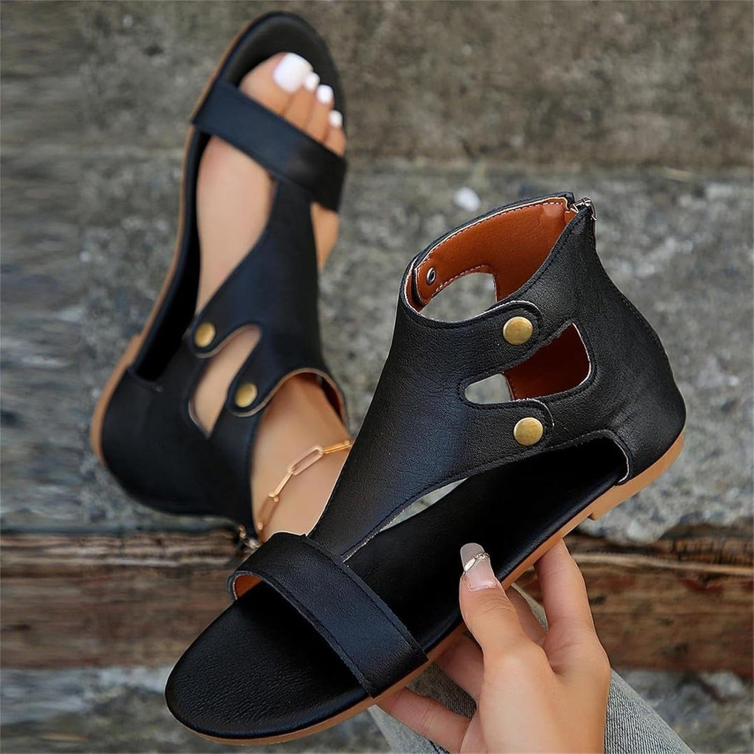 Black Delaney women's cutout orthopedic ankle sandals with secure straps and gold-tone accents.