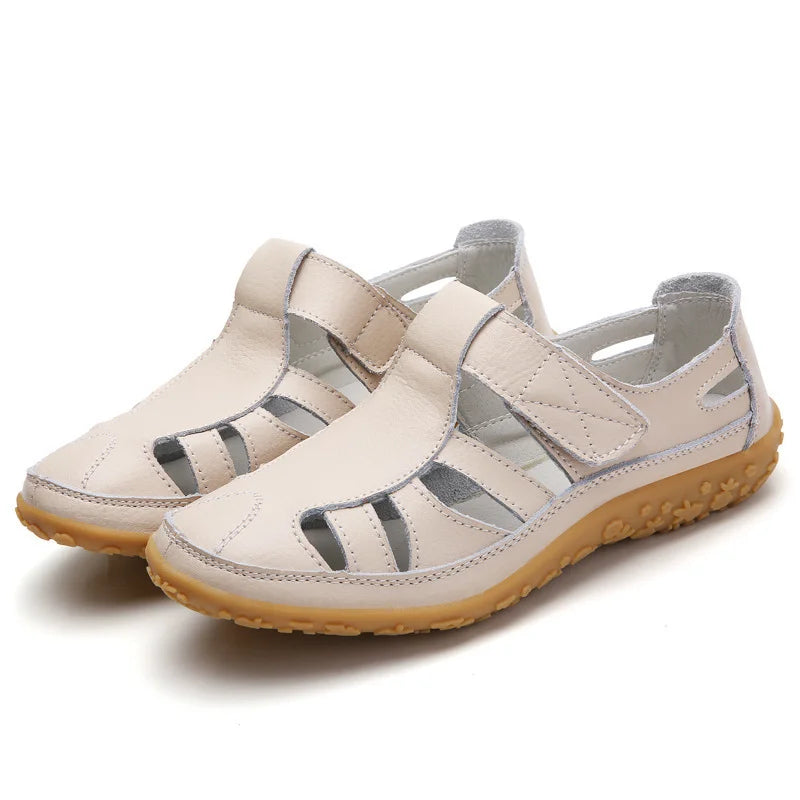 Emma women's closed-toe orthopedic walking sandals in a light beige, featuring adjustable straps and a supportive brown sole.