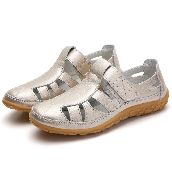 Emma women's closed-toe orthopedic walking sandals in metallic gold with adjustable straps and supportive brown soles.