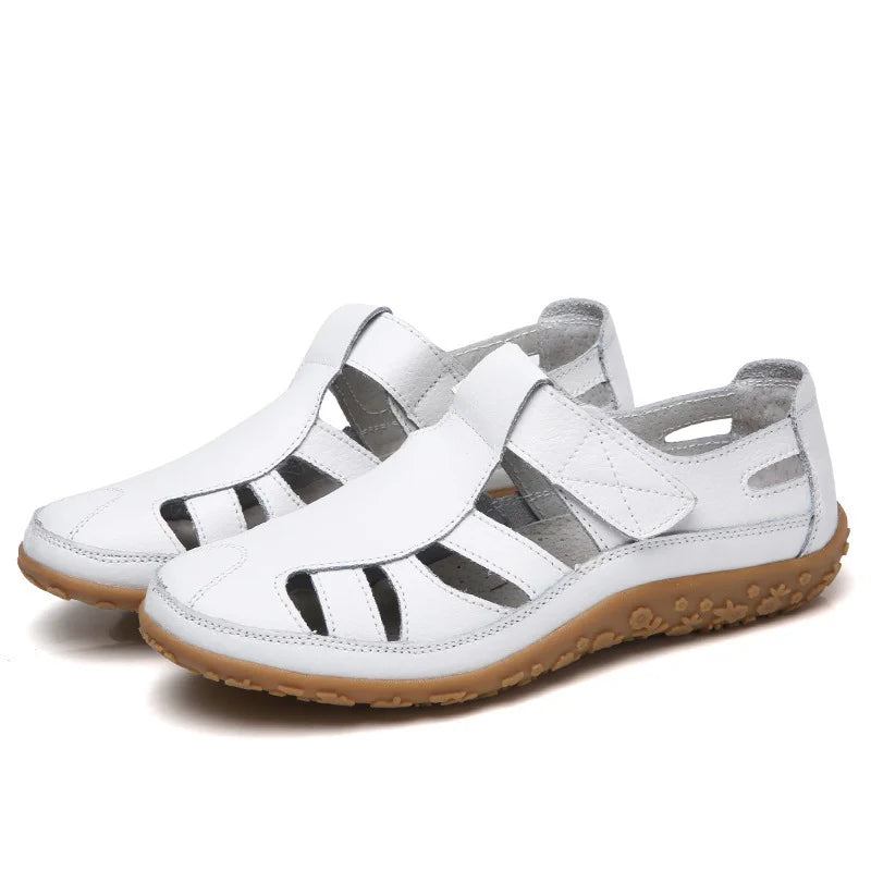 White Emma closed-toe orthopedic walking sandals with adjustable strap and supportive sole for everyday comfort.