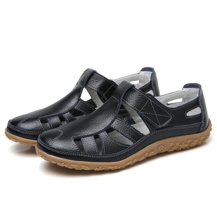Emma women's black closed-toe orthopedic walking sandals with adjustable strap and supportive sole.