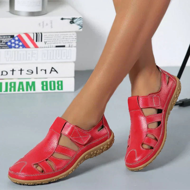 Emma red closed-toe orthopedic walking sandals with adjustable straps and supportive soles for comfortable everyday wear.