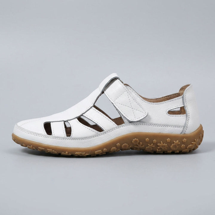 White Emma women's closed-toe orthopedic walking sandals with an adjustable strap and supportive brown sole.