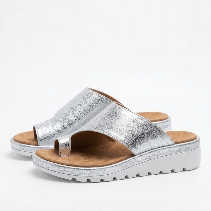 Silver Kai platform toe ring slide sandals with a cushioned footbed and white sole.