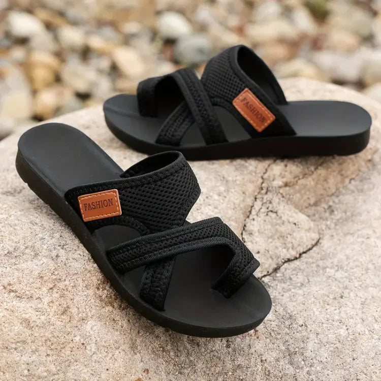 Black Kathleen women's mesh slide sandals with wide straps and a "FASHION" tag.