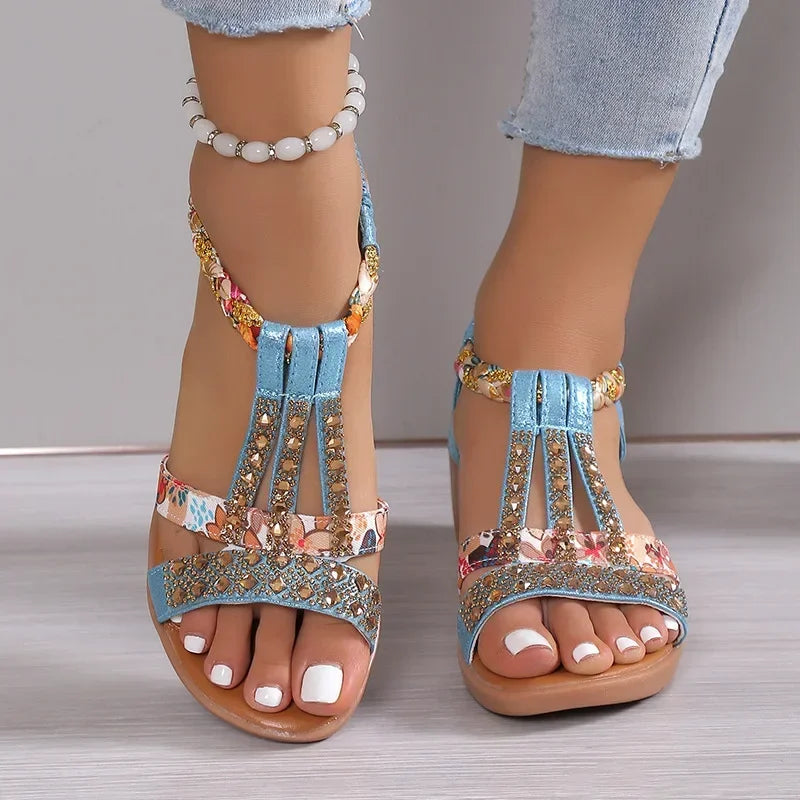 Women's Madeline beaded open toe wedge sandals in light blue with colorful floral and gold beaded straps.