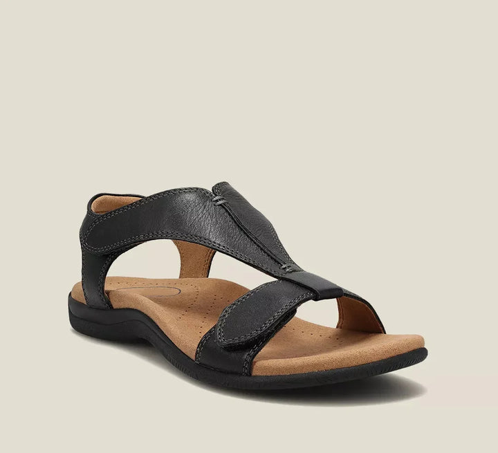 Black Maureen open-toe back strap sandals with adjustable straps and a flat sole for everyday comfort.