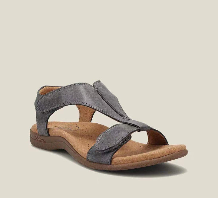 Maureen women's open-toe back strap sandals in charcoal gray leather with adjustable straps and a flat everyday sole.
