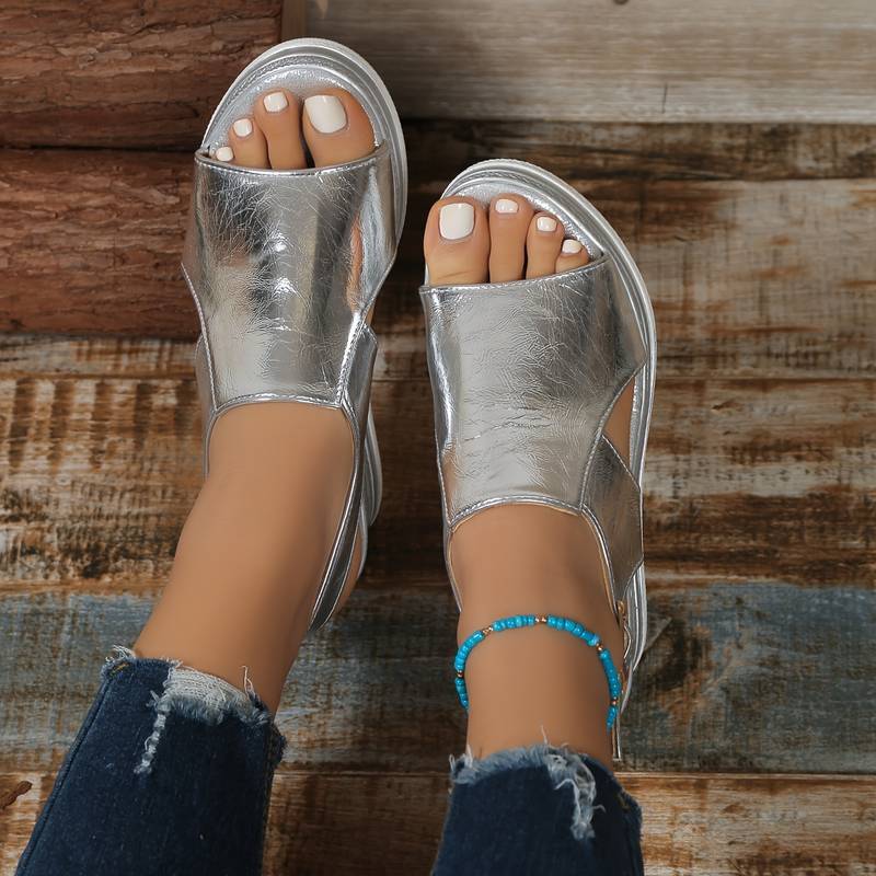 Women's Zafira metallic silver platform wedge sandals with open toe and slingback strap, perfect for summer.