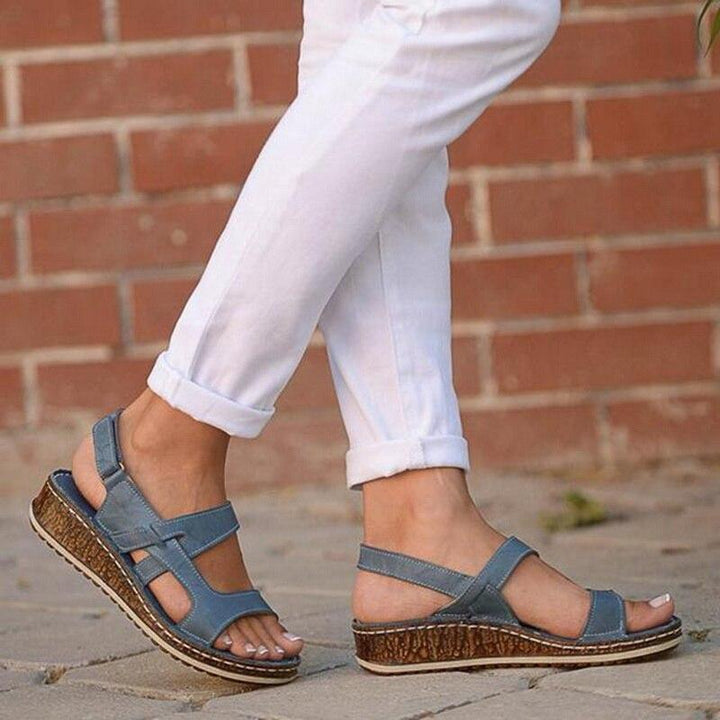 Zaria women's blue platform back strap sandals with clean cutout straps and a low platform sole for everyday lift.