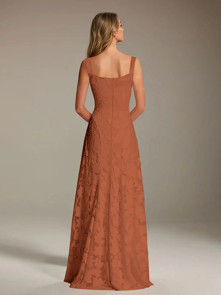 Adrienne women's rust floral lace A-line bridesmaid gown with square neckline, seen from the back.
