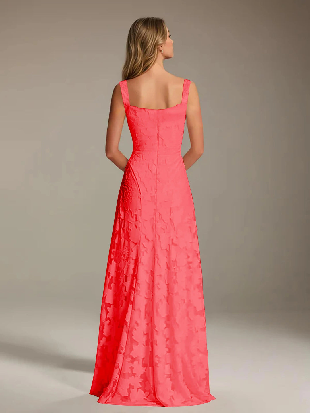 Adrienne coral floral lace A-line bridesmaid gown with square neckline, viewed from the back.