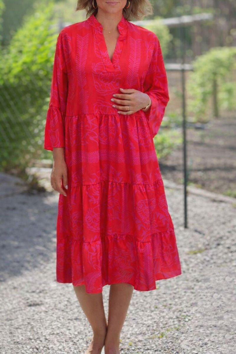 Women's Agnes tiered boho V-neck midi dress in bright red with pink leaf print.