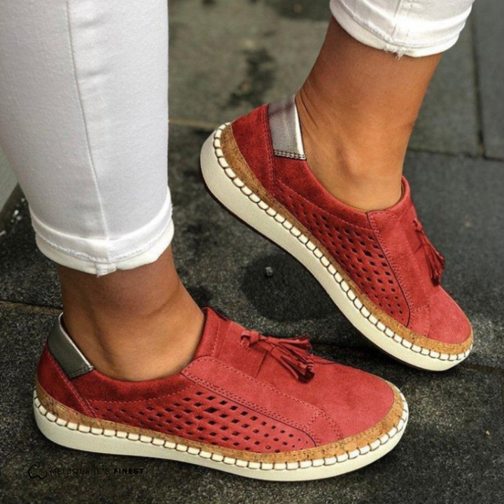 Red Amari women's orthopedic slip-on shoes with arch support, side view.