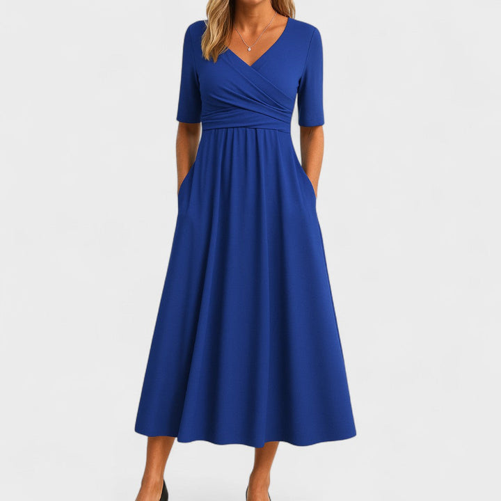 Amaya women's royal blue V-neck wrap-style midi dress with elbow sleeves and side pockets.