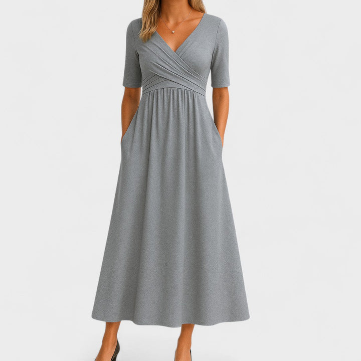 Amaya women's gray V-neck wrap-style midi dress with elbow sleeves and side pockets.