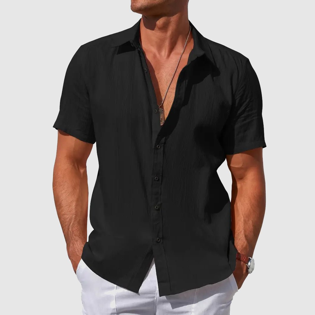 Men's black Asher short sleeve linen button-up shirt with subtle textured stripes and a classic collar.