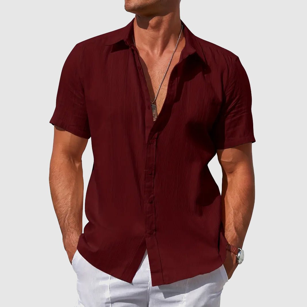 Men's Asher short sleeve linen button-up shirt in deep burgundy with subtle textured stripes.