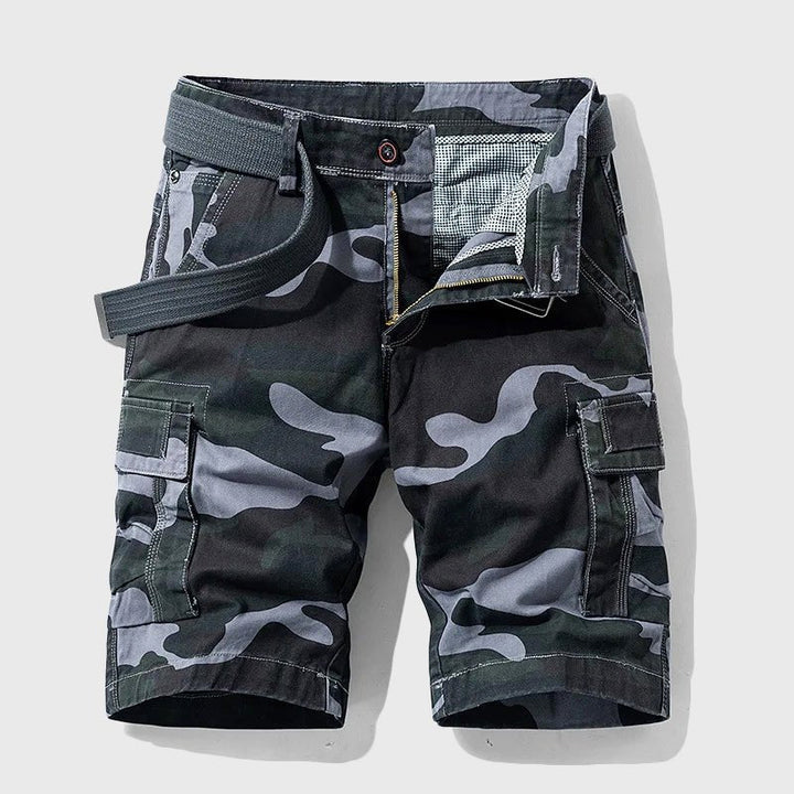 Men's Carter camo belted cargo shorts with side pockets and zip fly, offering a bold utility-inspired look.
