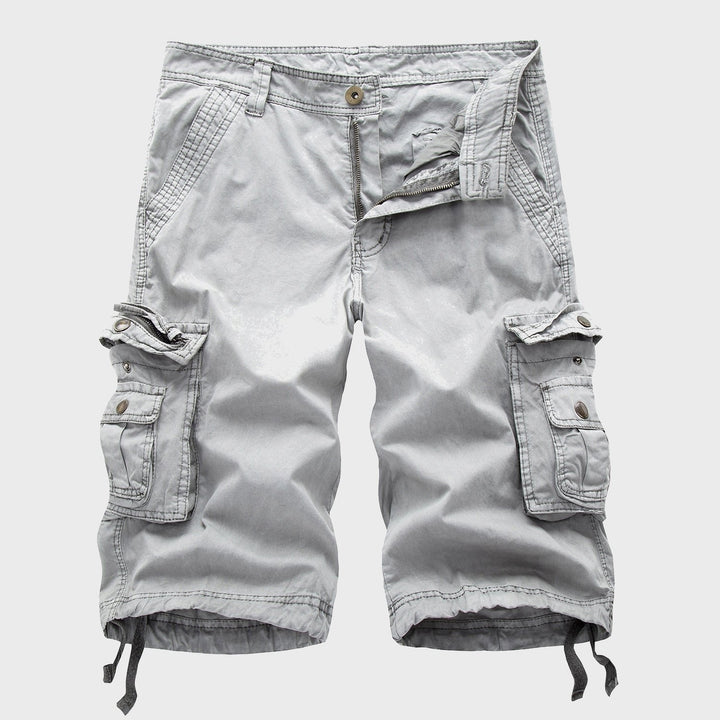 Men's Cole light gray knee-length cargo shorts with multi-pockets, zip fly, and adjustable drawstring hems.