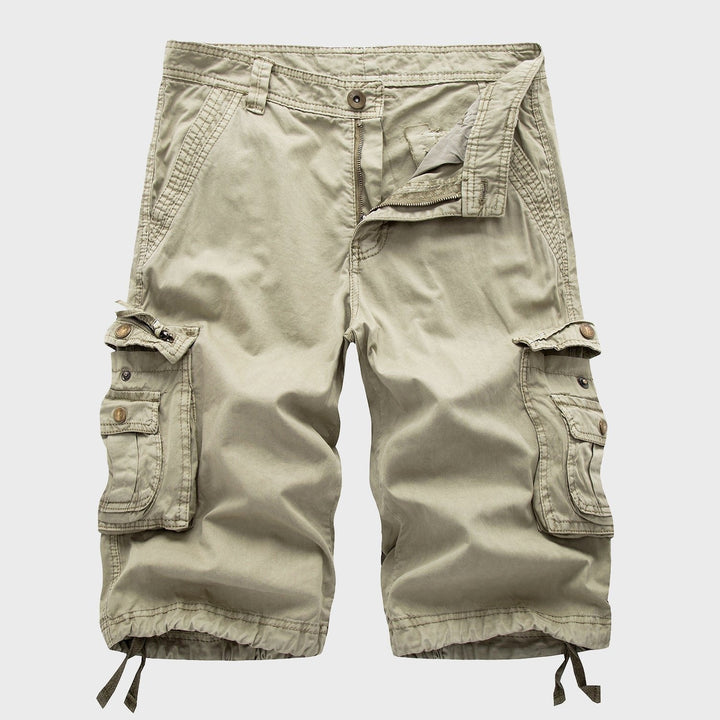 Men's Cole knee-length drawstring cargo shorts in a versatile khaki, featuring multi-pockets and adjustable hems.