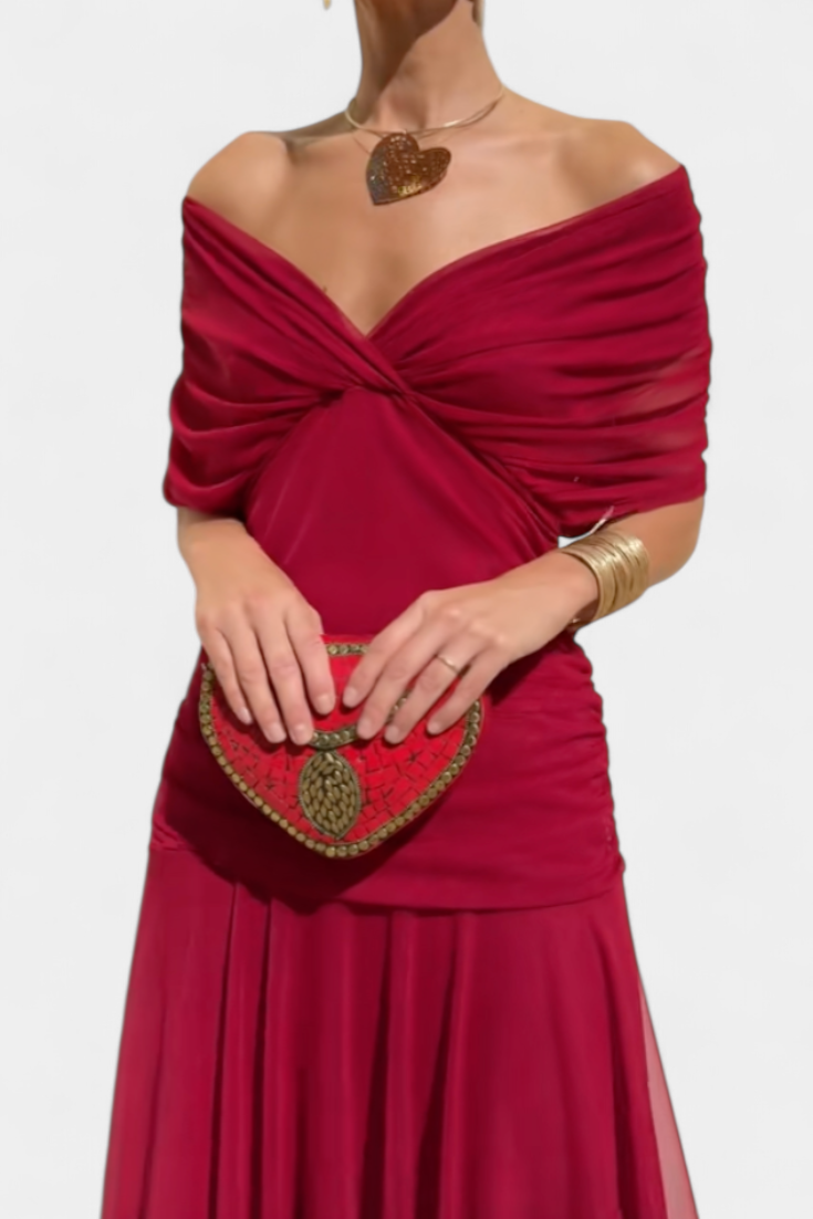 Red floral off-shoulder maxi dress with a ruched waist, flowing skirt, and short sleeves.