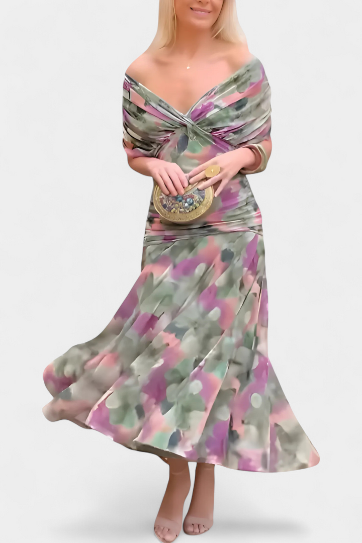 Green floral off-shoulder maxi dress with a ruched waist, flowing skirt.