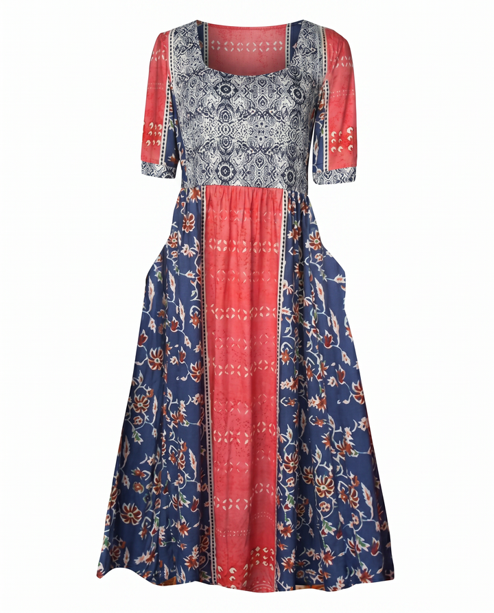 Dahlia women's square neck boho midi dress with blue, red, and white floral and geometric print, shirred bodice, and tiered skirt.