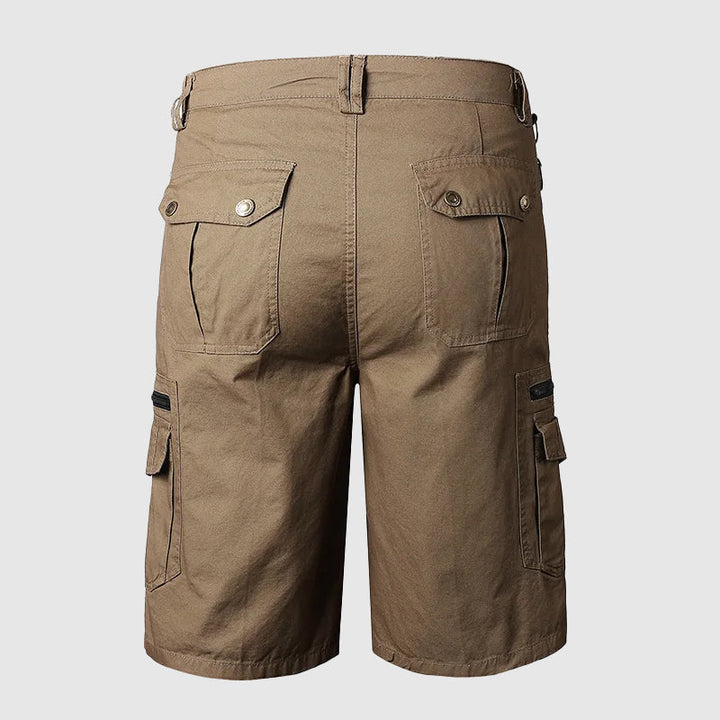 Men's Dominic khaki cargo shorts with multiple pockets, zipper accents, and knee-length cut.