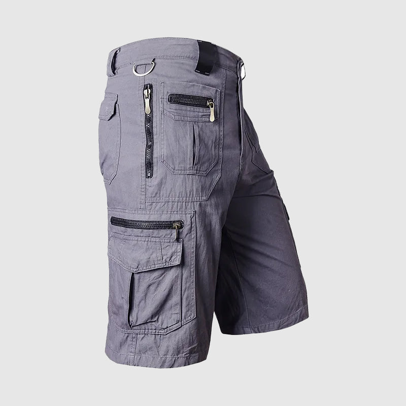 Men's gray Dominic cargo shorts with multiple zipper and flap pockets, knee-length cut, and utility-inspired design.