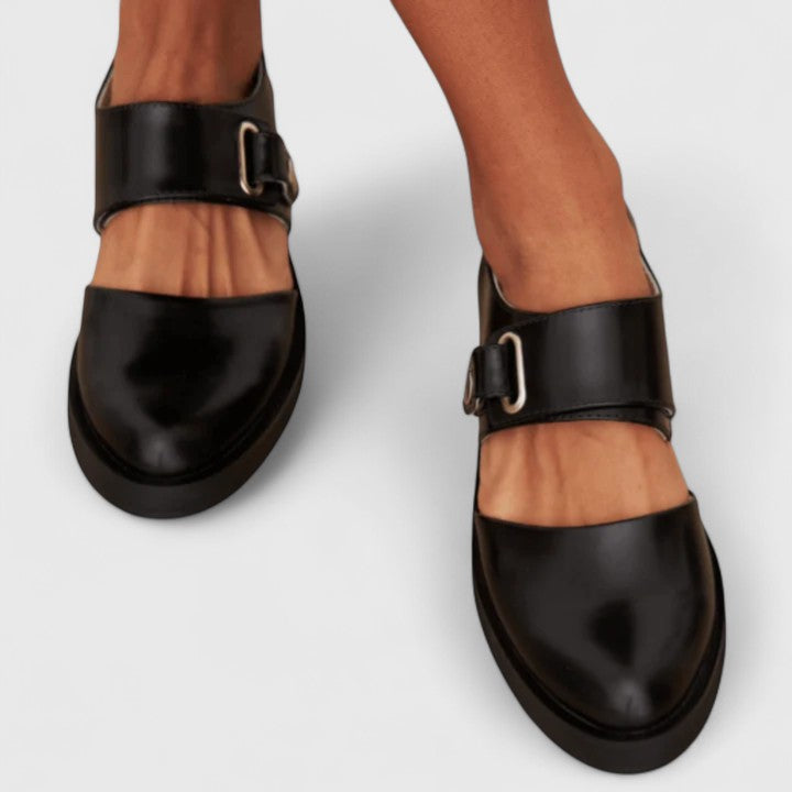 Elsie women's black leather Mary Jane shoes with a buckle strap and low block heel.