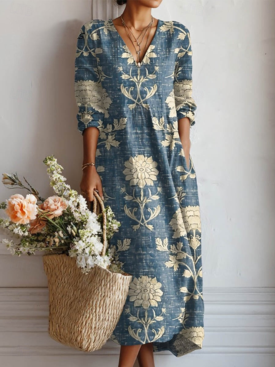 Women's Eviana boho linen floral V-neck midi dress in blue with three-quarter sleeves and pockets.