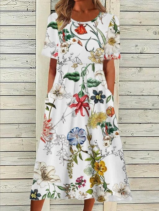 White short sleeve floral printed midi dress with round neckline and side pockets.