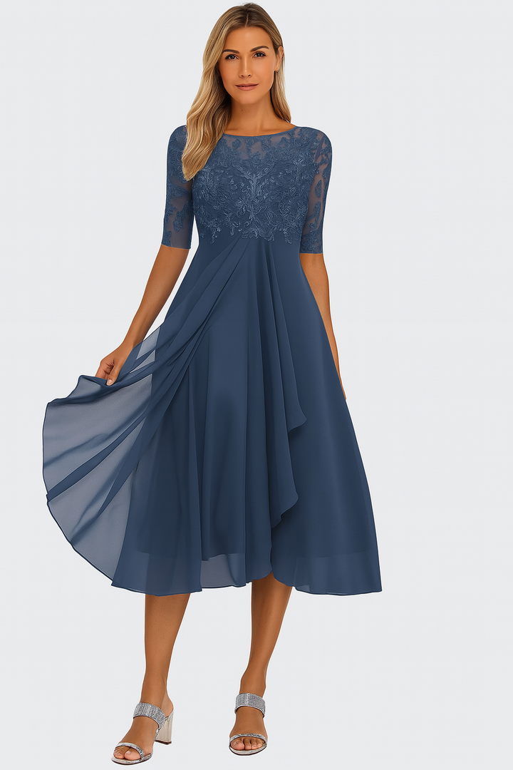 Greta women's navy blue lace A-line midi dress with sheer half sleeves and flowing skirt.