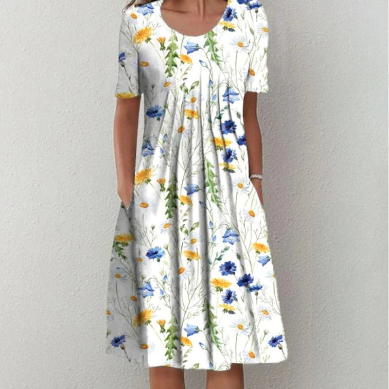 Yellow floral midi dress with pockets and short sleeves for women.