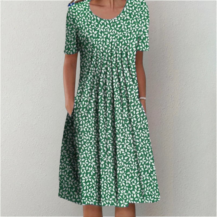 Green floral midi dress with pockets and short sleeves for women.