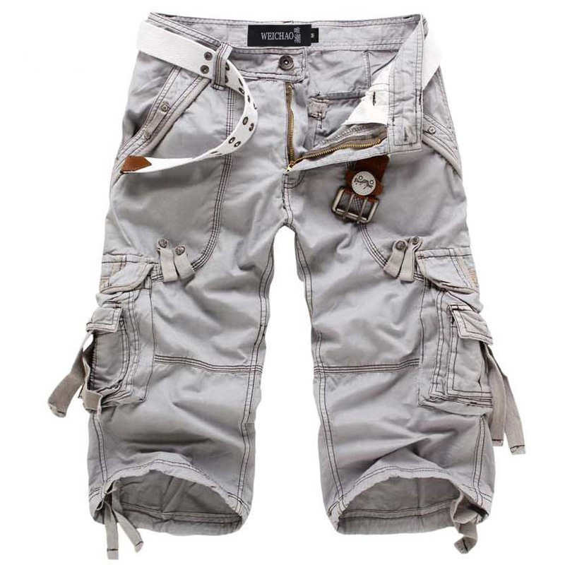 Men's Heinrich knee-length light grey cargo shorts with multiple utility pockets, a built-in white belt, and button/zip closure.