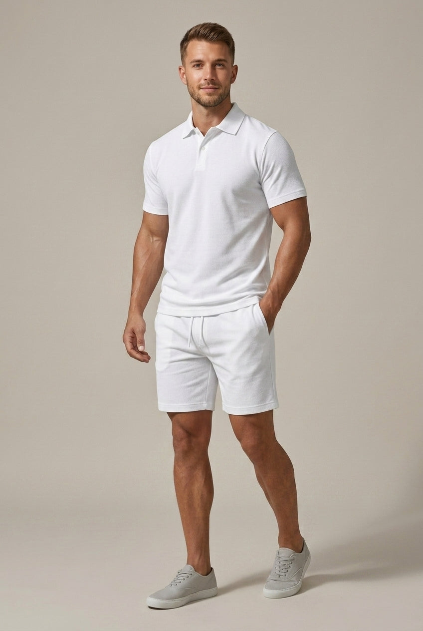 Men's Hugo white short sleeve polo shirt and matching drawstring shorts set.