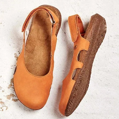 Orange Isadora women's orthopedic closed-toe sandals with cushioned footbed and adjustable strap.