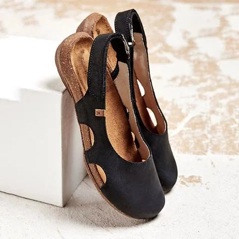 Black women's orthopedic closed-toe sandals with cushioned footbed and adjustable strap.