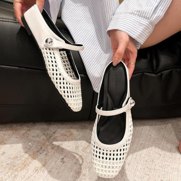 Beige woven orthopedic mule flats with a Mary Jane strap.