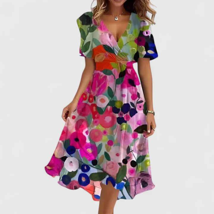 Leandra women's floral V-neck midi dress with short sleeves and a flowing skirt.
