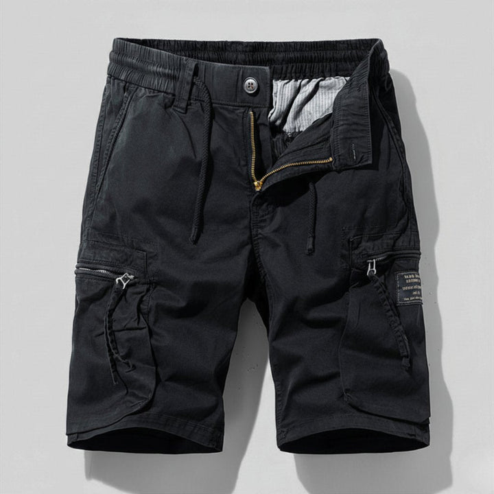 Men's black Leo elastic waist cargo shorts with drawstring, zip fly, and practical side pockets for utility style.