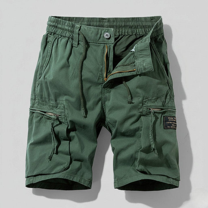 Men's Leo olive green elastic waist cargo shorts with drawstring, zip fly, and practical side pockets.
