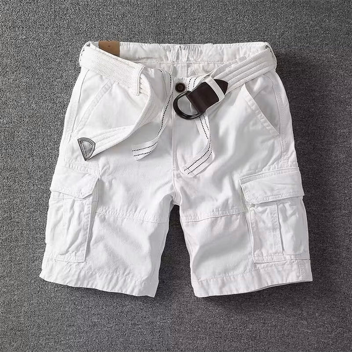 Men's white Logan cargo shorts with a matching belt, button-front waist, and utility pockets.