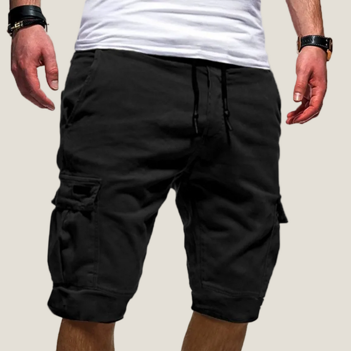 Men's black drawstring cargo shorts with knee-length cut and visible side pockets.